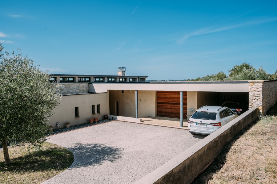 Photograph of house with the barn behind